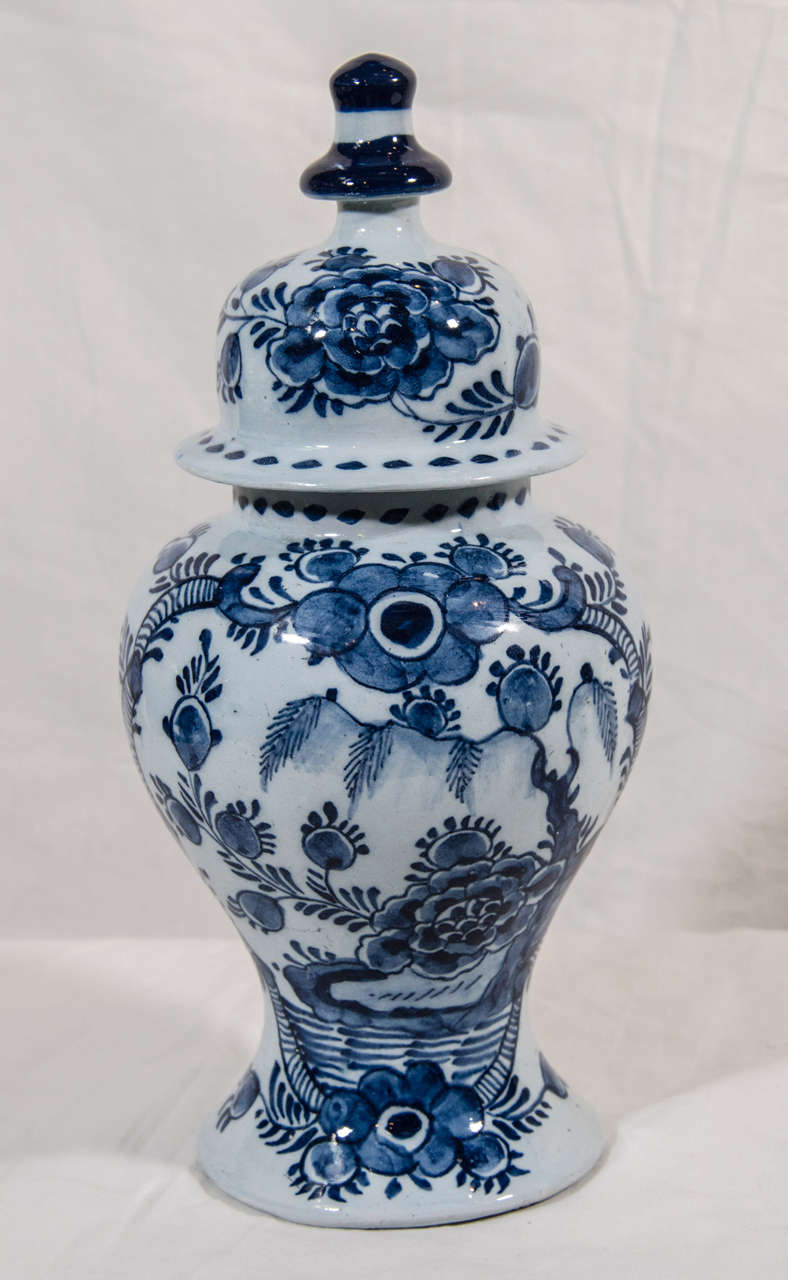 A Pair of Small Dutch Delft  Blue and White Covered Vases