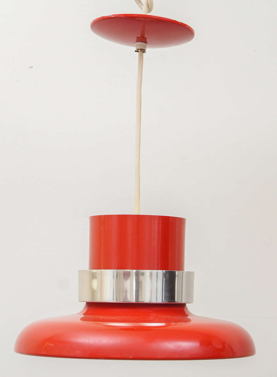 A Brilliantly Red Enameled Finish with Striking Chrome Band
Manufactured by Lightolier in the 1970's