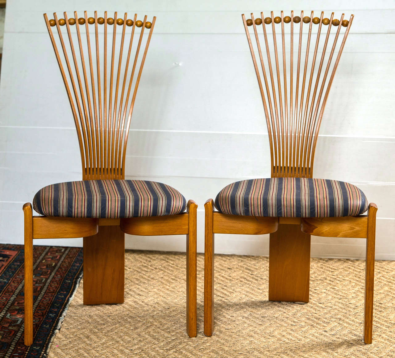 A set of mid-century modern Poly-craft Fan Back side Chairs. Each trangular bottom supporting a stripped cushion. The backs done in a fan style with spear circular divisions.