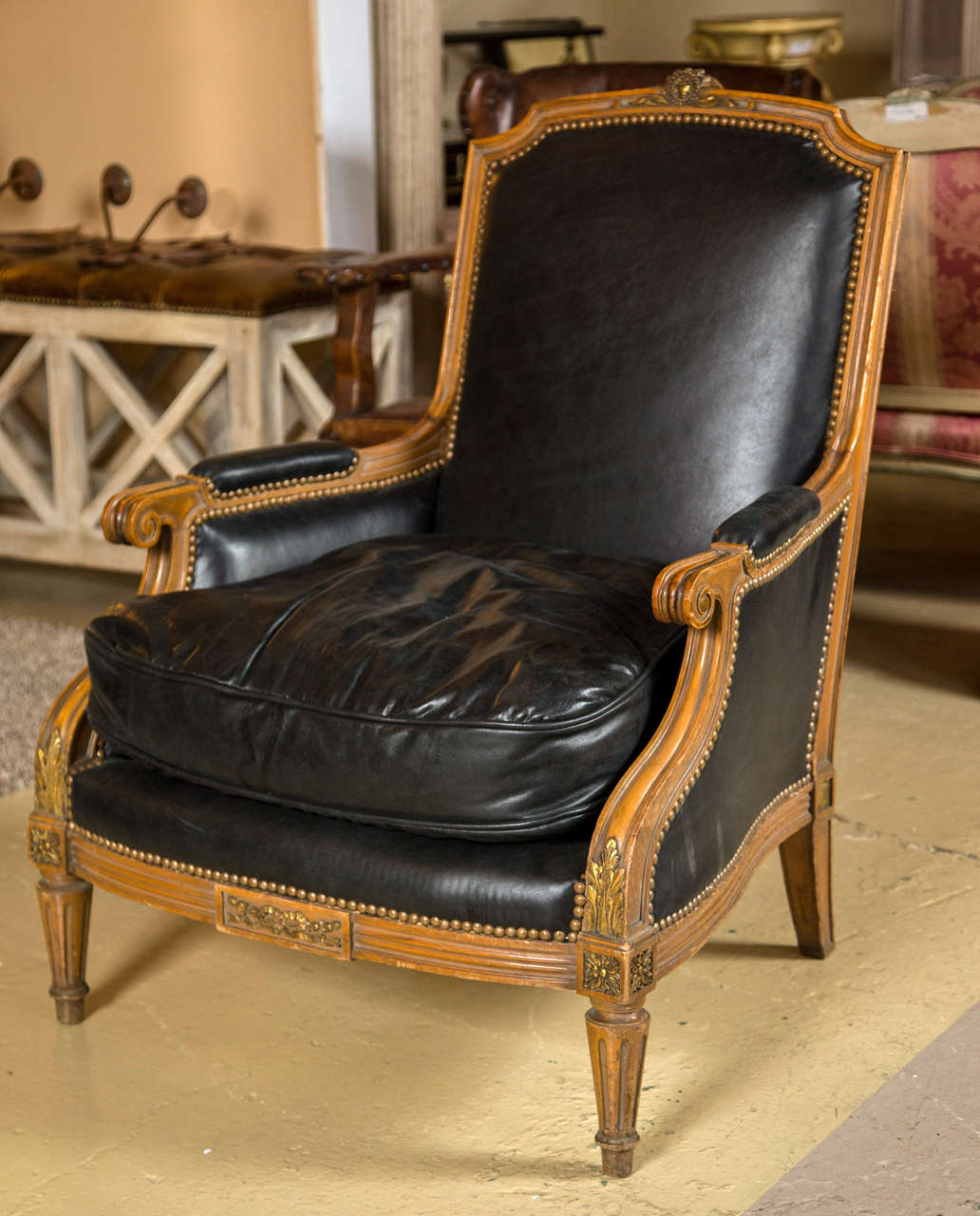 French Pair of Louis XVI Style Worn Leather Bergere Chairs attributed to  Jansen