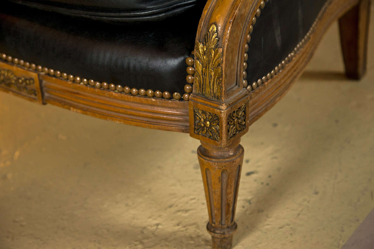 Pair of Louis XVI Style Worn Leather Bergere Chairs attributed to  Jansen In Good Condition In Manhasset, NY