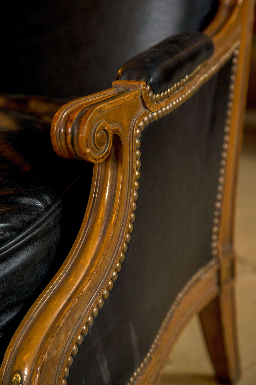 Mid-20th Century Pair of Louis XVI Style Worn Leather Bergere Chairs attributed to  Jansen