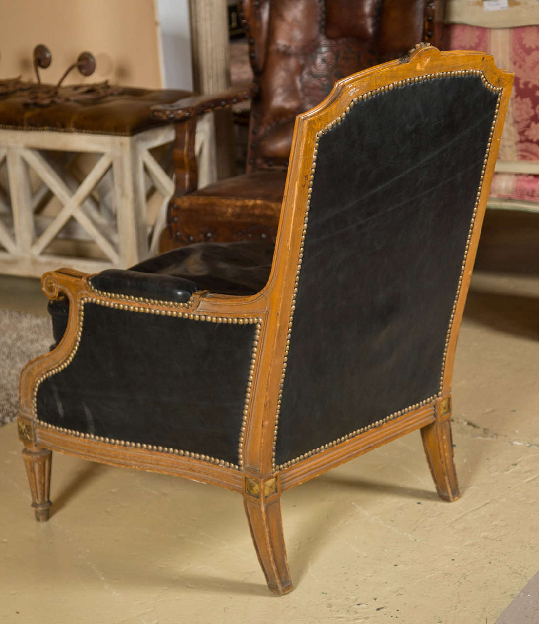 Pair of Louis XVI Style Worn Leather Bergere Chairs attributed to  Jansen 4