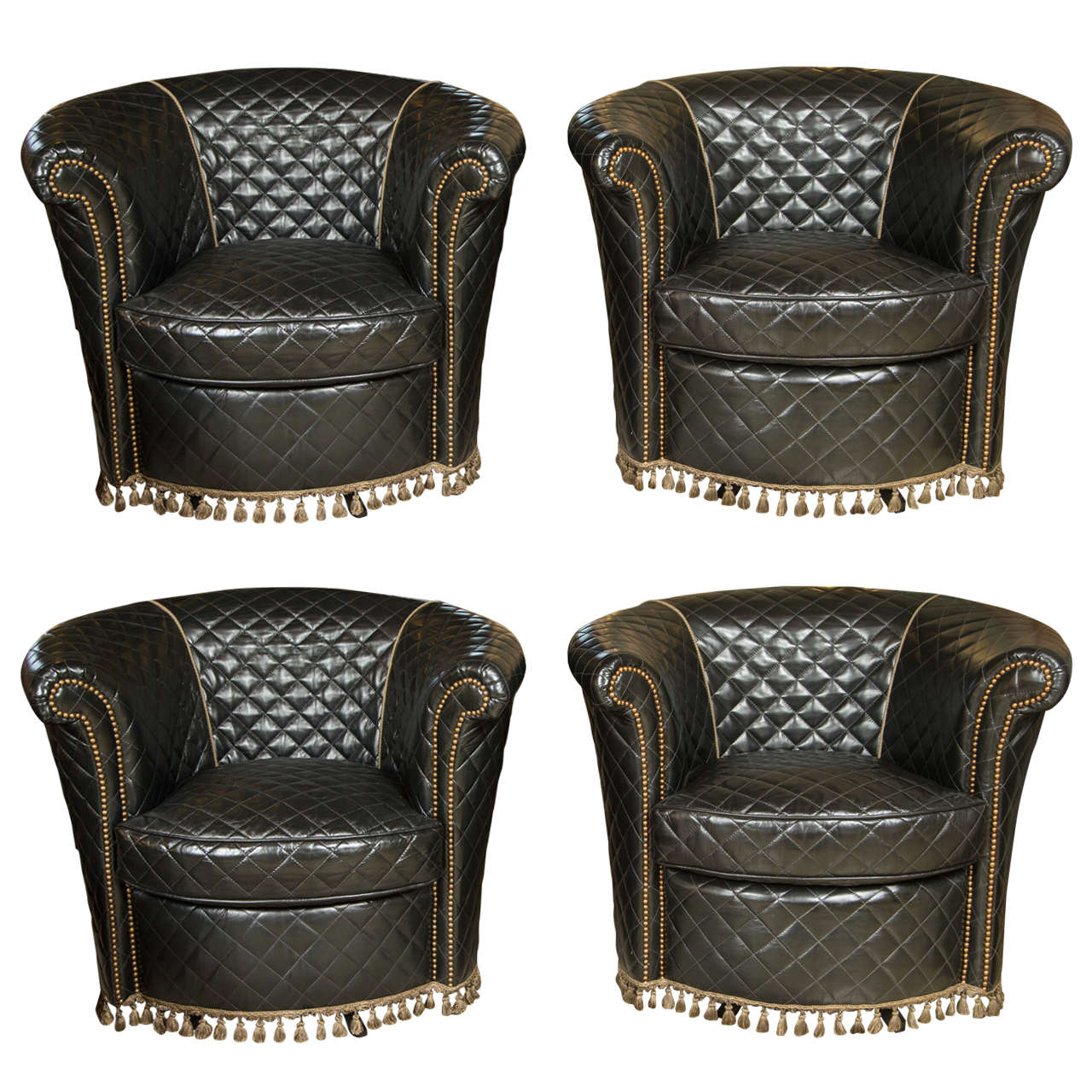 A Group of Four Coco Chanel Styled Barrel Back Leather Chairs