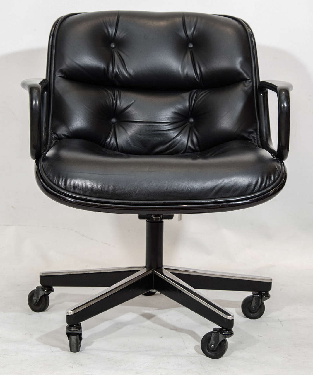 Handsome, comfortable and nicely detailed desk chair by Charles Pollock for Knoll. In black leather; adjustable. Please contact for location.