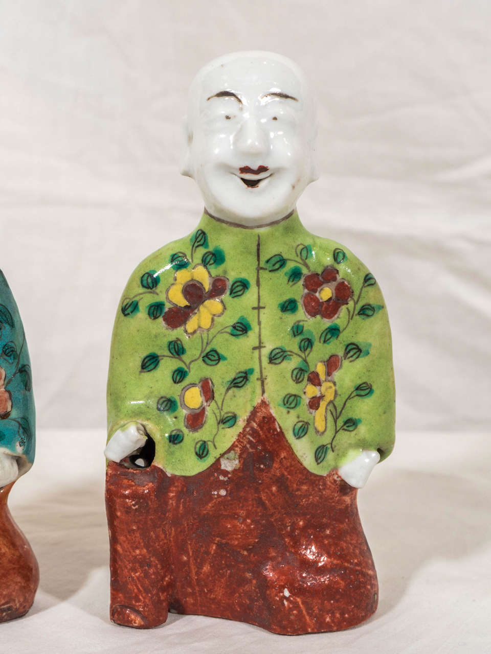 Qing Pair of Laughing Boys Painted in Turquoise and Green