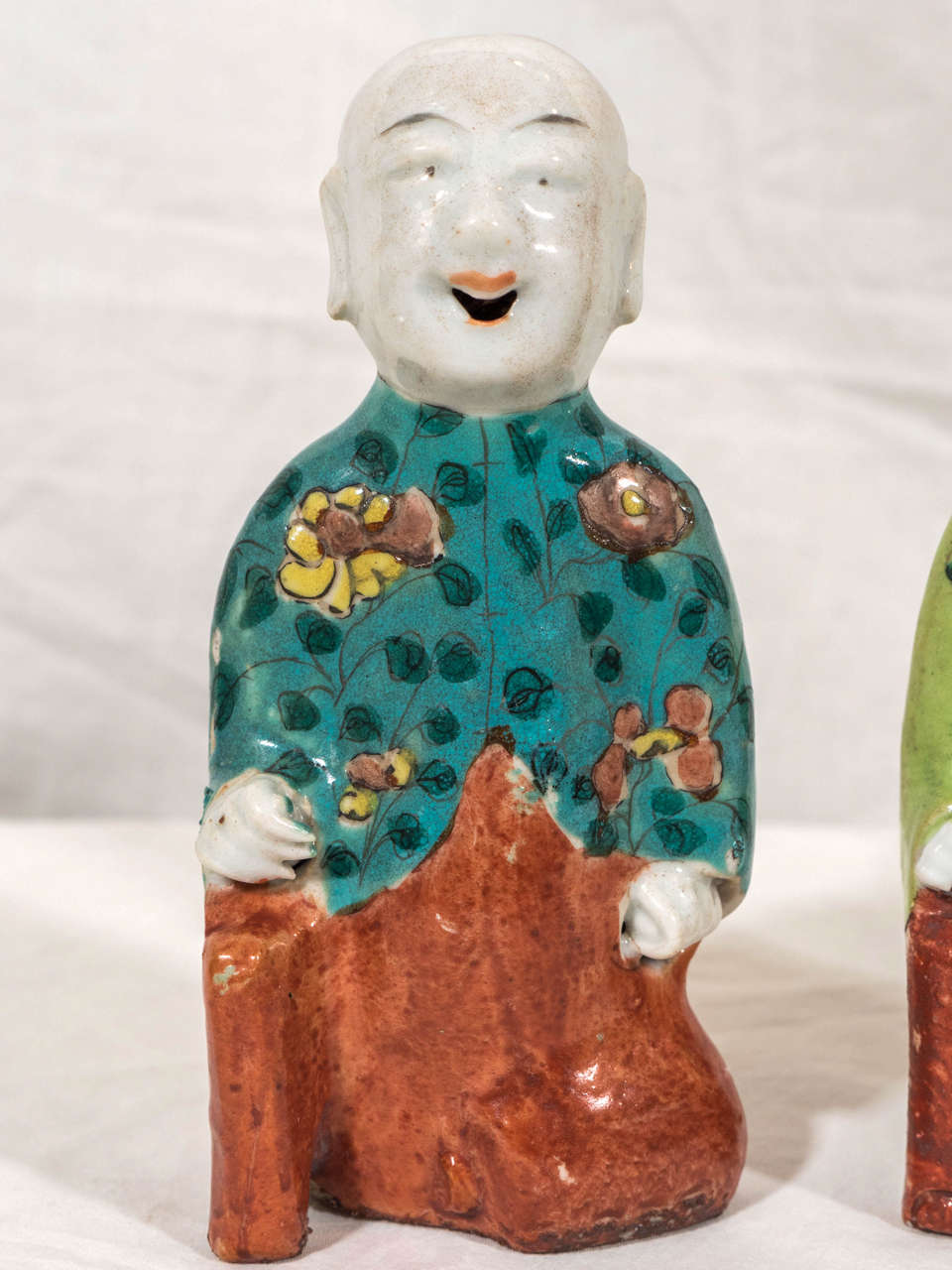 Chinese Pair of Laughing Boys Painted in Turquoise and Green
