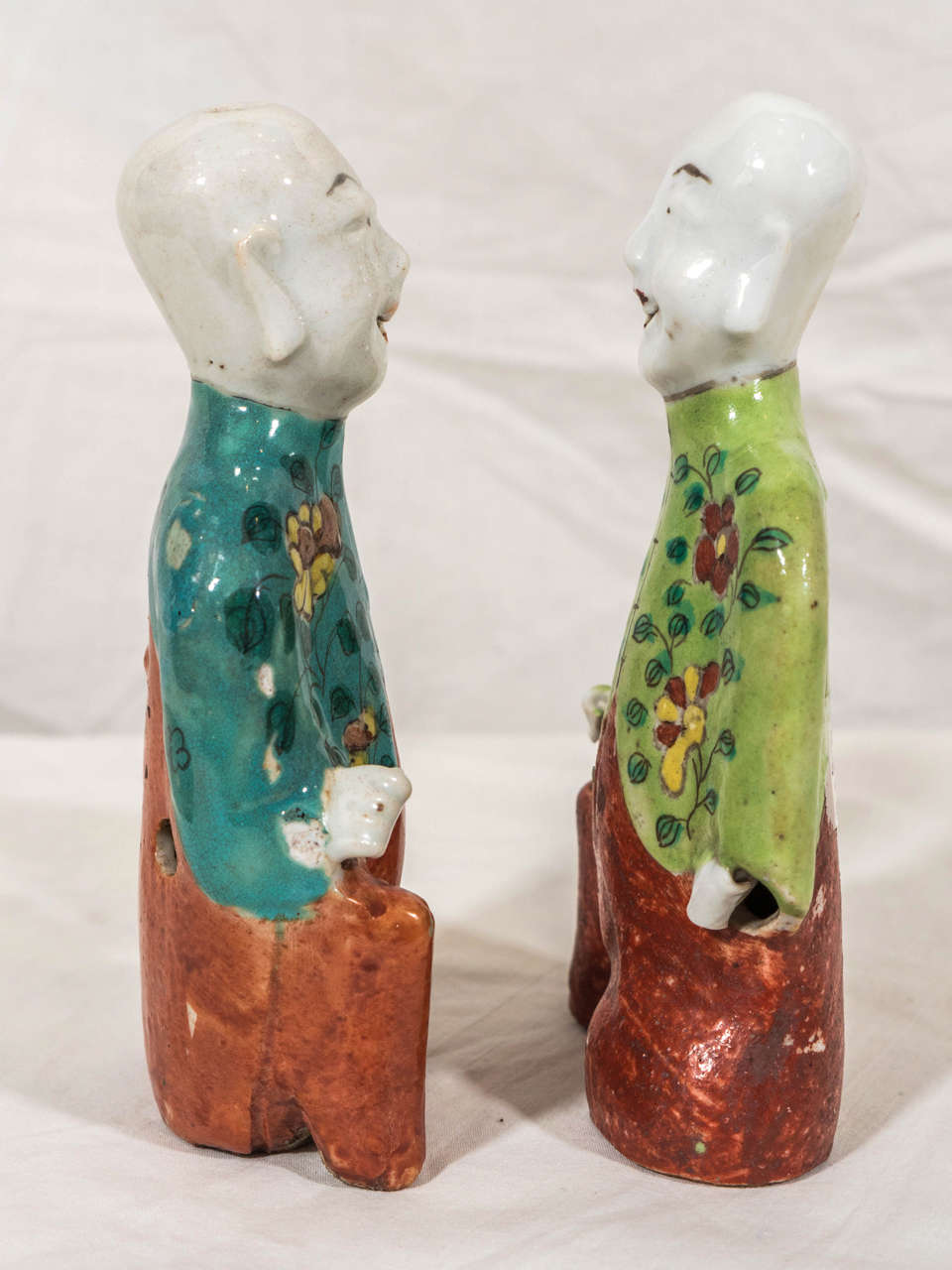 Pair of Laughing Boys Painted in Turquoise and Green In Excellent Condition In Katonah, NY
