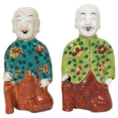 Antique Pair of Laughing Boys Painted in Turquoise and Green