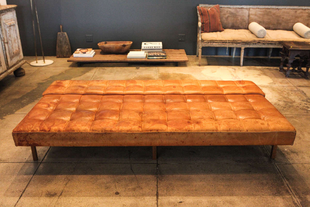 Produced in small numbers, this sofa or daybed has dual beauty. Perfectly patinated throughout.