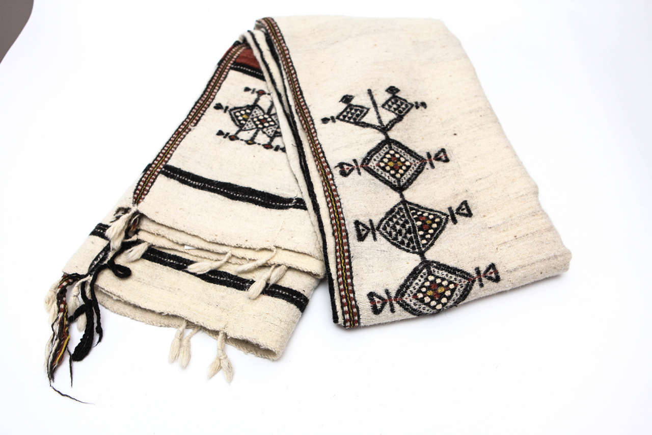 Traditional hand woven, brocaded blanket for Fulani tribal weddings (West, Central and Sudanese Africa). Made in two panels, white wool with brownish red and black handweave brocade.