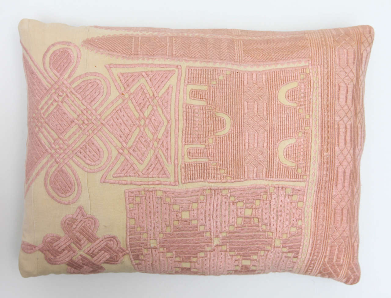 Made from a Hausa Chief's Robe, known as a Boubou. Hausa is the largest tribal group in Nigeria. Machine embroidery cotton over handwoven cotton fabric.  Narrow panels sewn together.  Pink color is unusual.  Natural linen back. Feather and down
