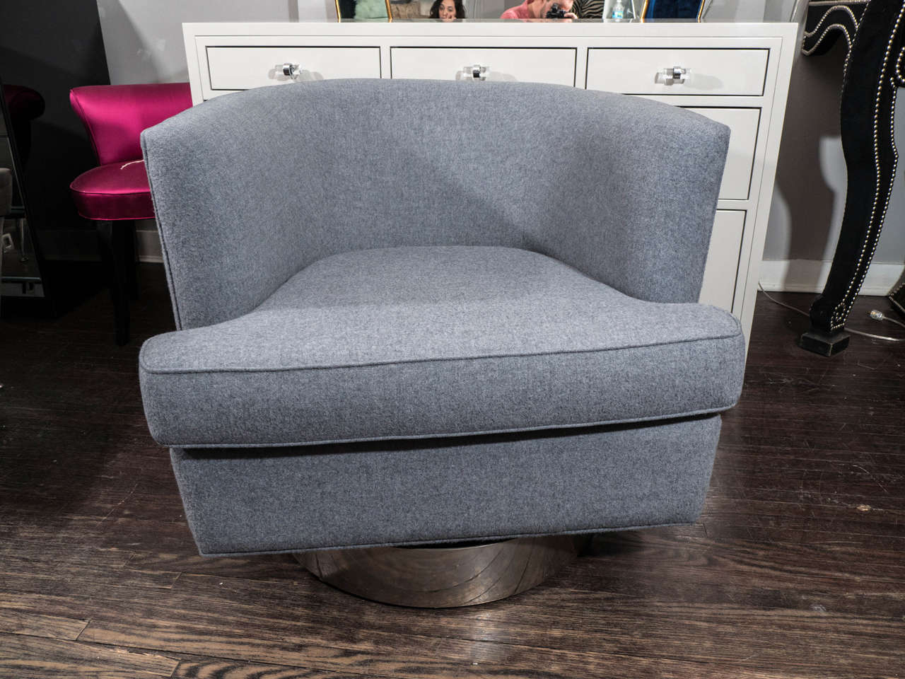 Pair of Milo Baughman swivel chairs upholstered in heather grey wool.
