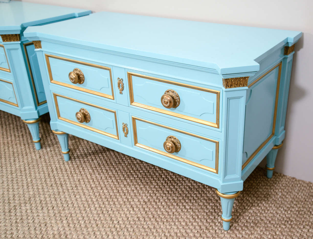 A glamorous pair of chests made by Karges Furniture, lacquered in Tiffany blue with gold accents,  Ca. 1970s.