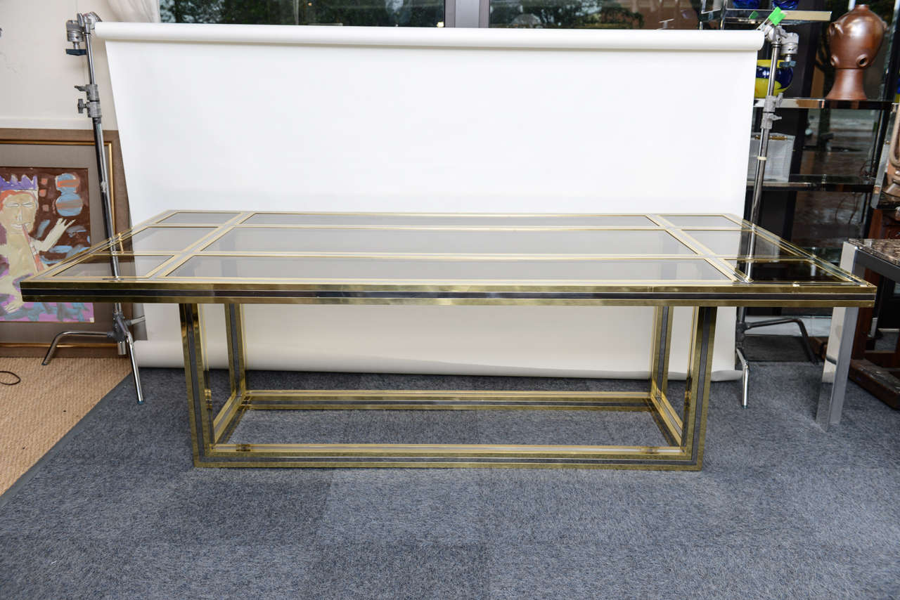 Beautiful restored Italian table by Romeo Rega in chrome and brass, new tinted glass.