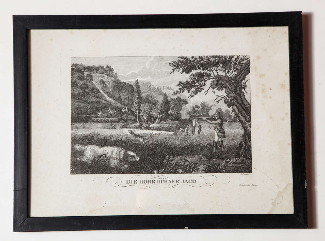 A set of three early 19th century black and white German engravings on paper depicting various hunting scenes. Original black-painted wooden frames with new archival backings.