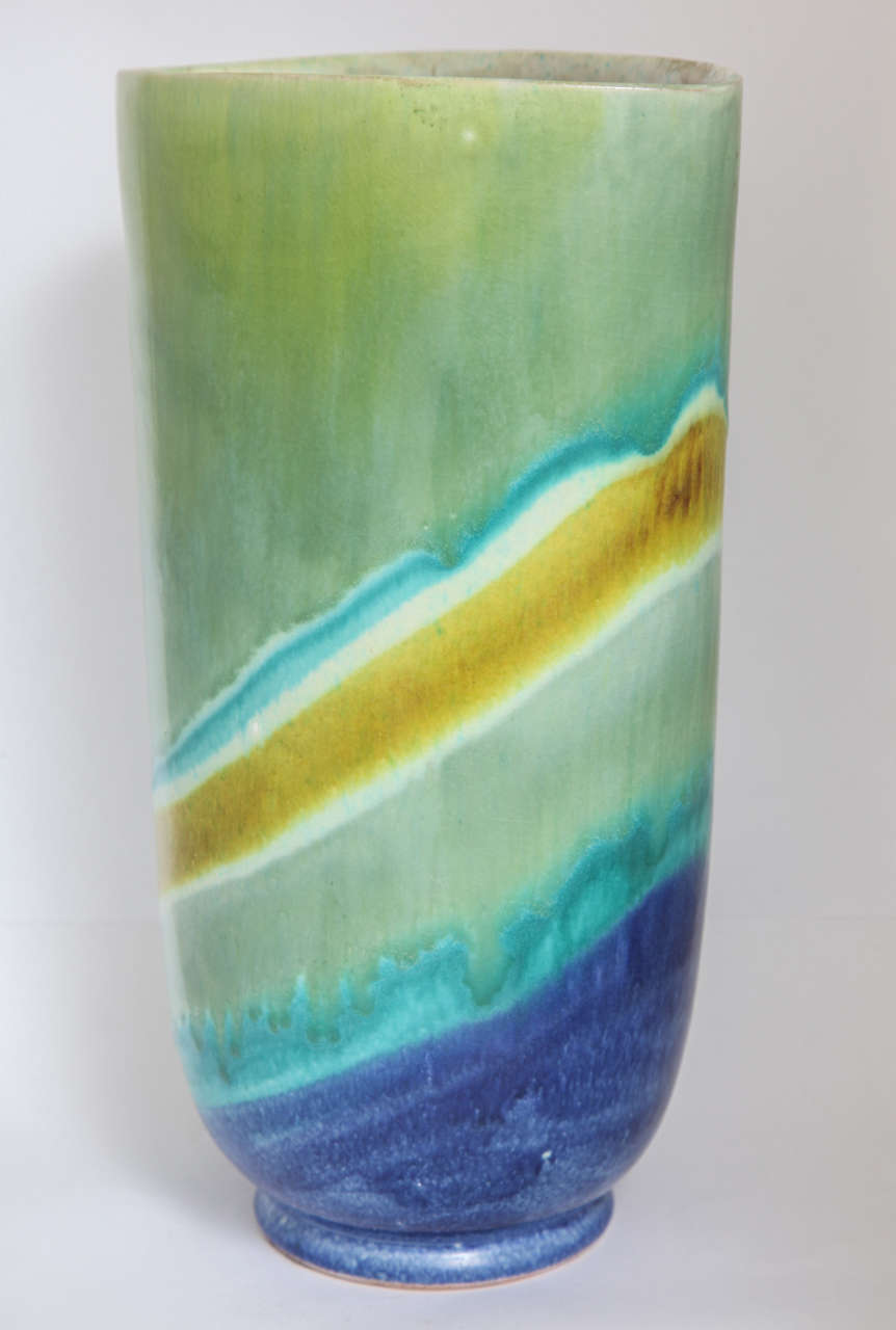 Vintage Raymor vase glazed in drippy layers of blues, greens and yellow. Signed to underside.