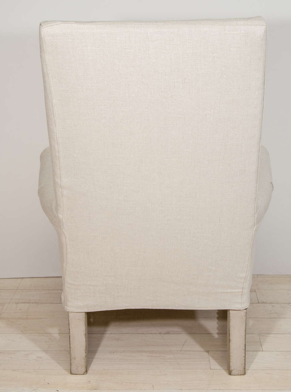 Pair of High-Backed Upholstered French Arm Chairs with Spool Base 1