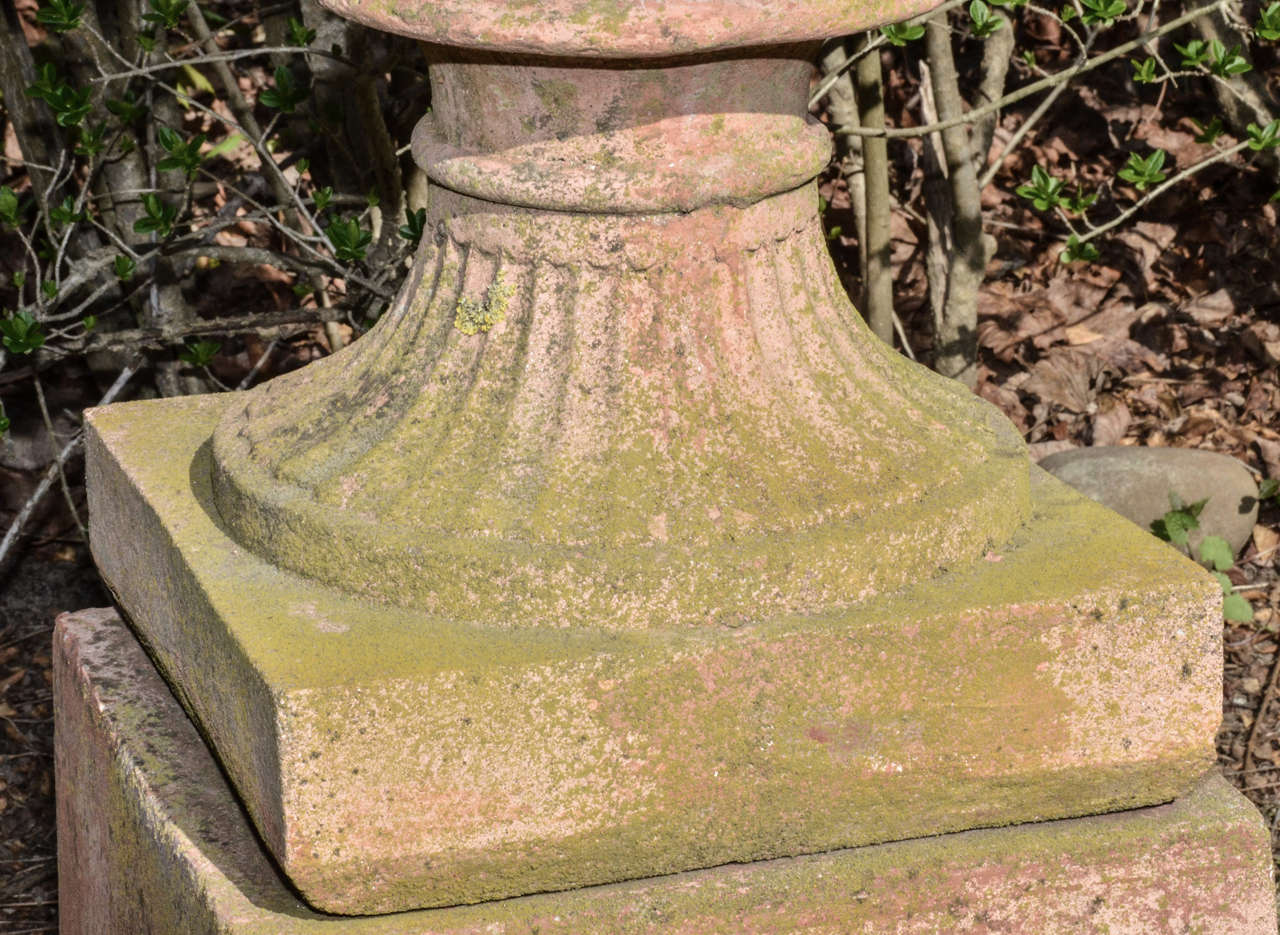 English Terra Cotta Color Cast Stone Neo Classical Style Urns On Pedestals In Good Condition For Sale In Southampton, NY