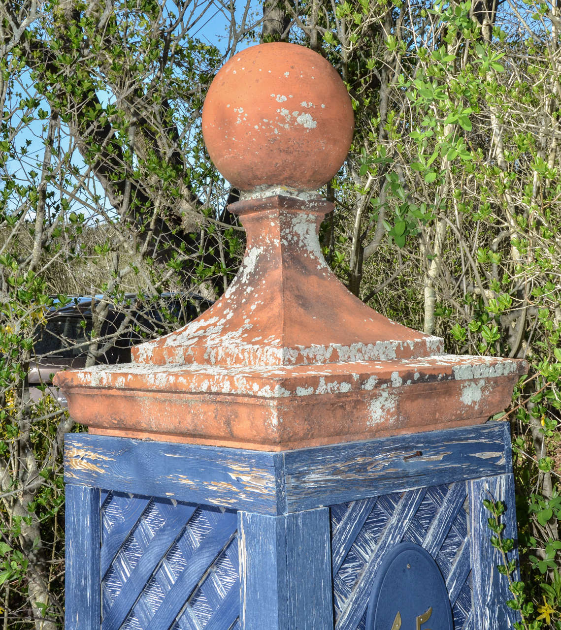 19th Cent. English Terra Cotta Ball Gatepost Finials. Comprised Of A Moulded Square Base With a Tapering Pedestal Supporting The Ball. The Finals Have Beautifully Aged Patina. Great For Entrance To A Driveway Or In A Garden. The Wooden Lattice Gate