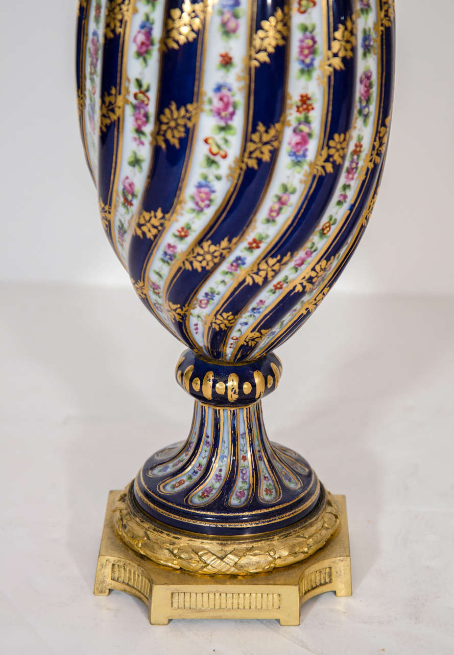 Louis XVI Pair of Antique French Sevres Style Porcelain and Gilt Bronze Covered Vases For Sale