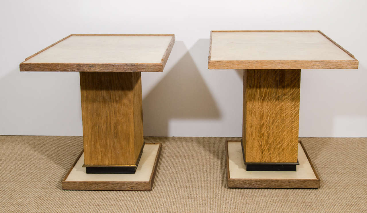 Pair of French parchment and cerused oak side tables with brass 
detail in the manner of Dupré-Lafon.