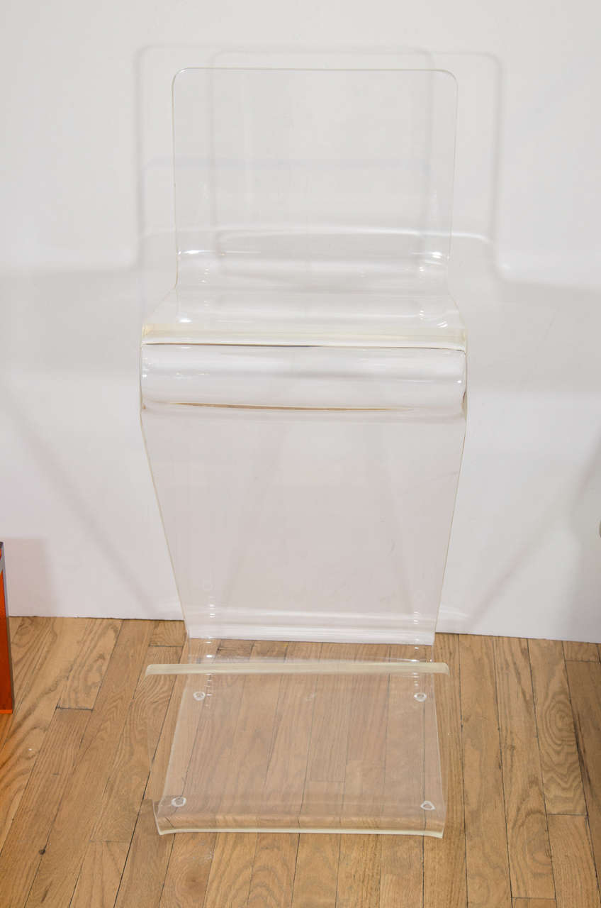 Set of three Z form lucite bar stools by Gary Gutterman.