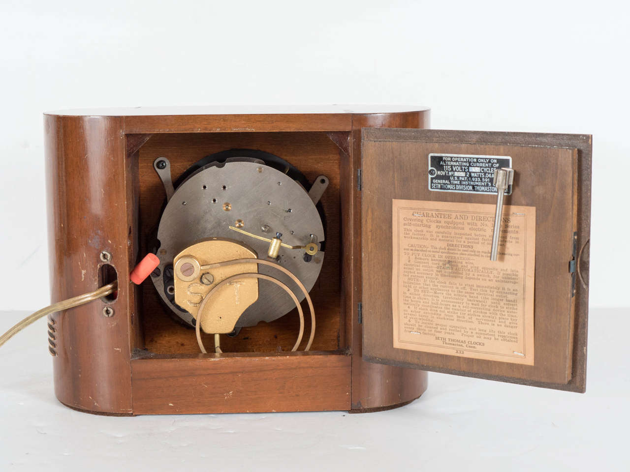 Streamlined Electric Art Deco Clock by Seth Thomas in Bookmatched Walnut In Excellent Condition In New York, NY