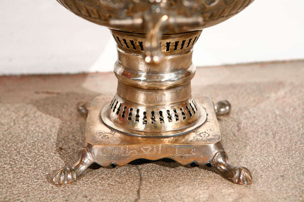Exceptional hand-crafted Moroccan samovar with etched and embossed floral designs.
Middle Eastern Samovar, Islamic style Samovar handcrafted in Fez, Morocco.
Brass and silver plated. For decor only.