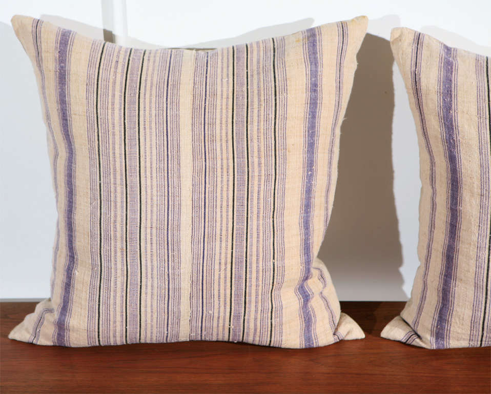 Vintage ticking stripe grain sack fabric pillows in lavender.