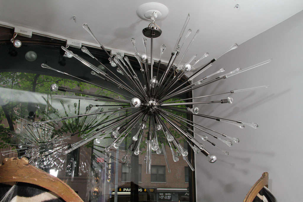 Custom glass rod and teardrop glass Sputnik chandelier with black nickel plated frame. Customization is available in different sizes and finishes.