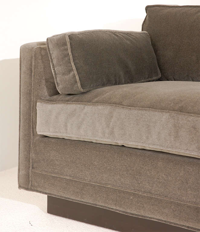 This handsome custom tuxedo-style sofa was designed by William 