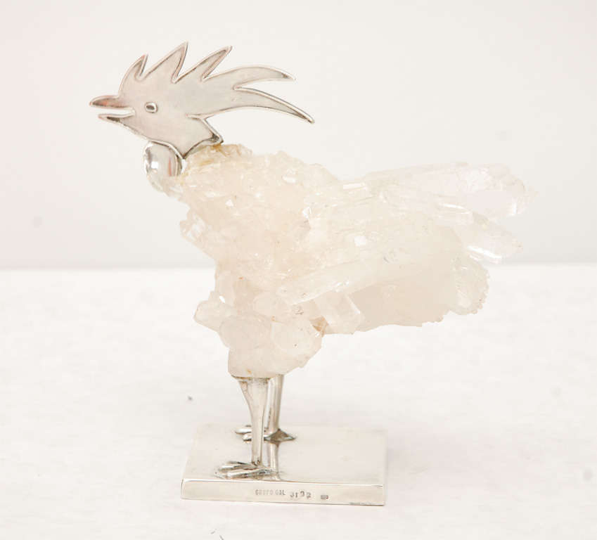 A quirky rock crystal and sterling silver rooster statue stamped 