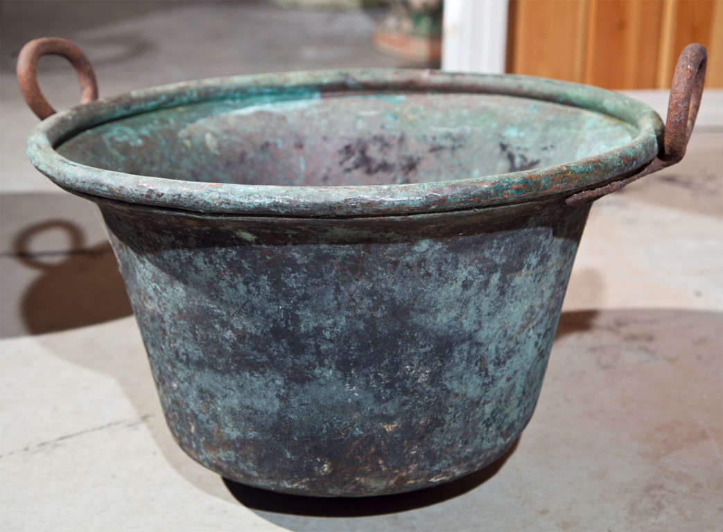 We love this copper bin for it's perfect verdigris surface, loop iron handles, rolled rim, and amazing versatility. Great as a planter or storage bin in the mudroom, perhaps it's best and highest use is for kindling or small logs next to your