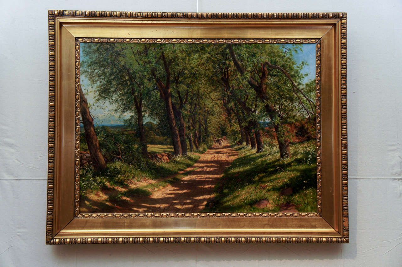 Large summery landscape by Danish Artist Carl Milton Jensen (1855-1928) of a drover herding cattle down a tree-lined lane.  Signed and dated 1915.  Milton Jensen exhibited in Charlottenborg throughout the years and in Chicago in 1893.   Original