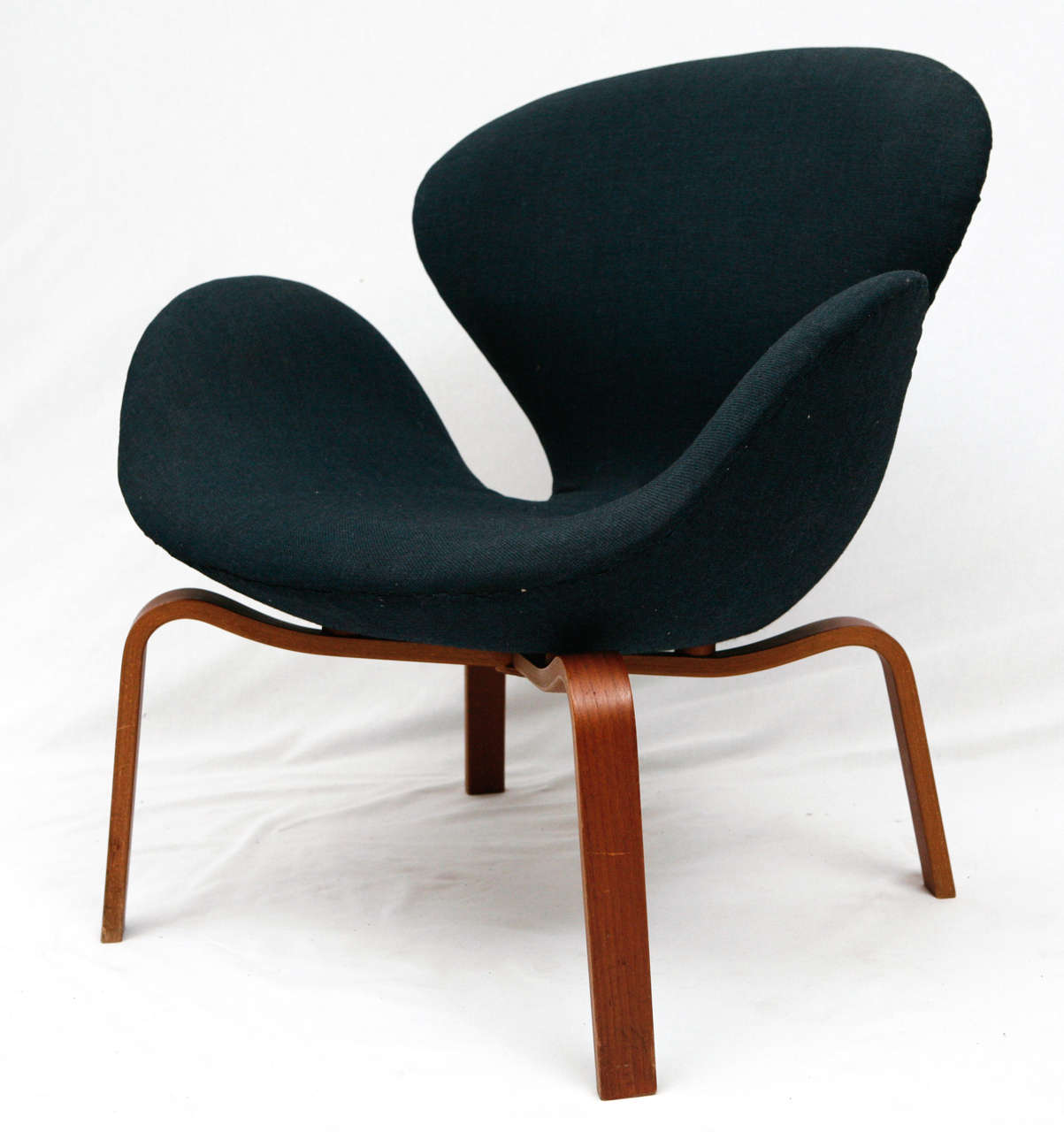 Arne Jacobsen Swan Chair With The Wood Legs.  Model # 4325.
Produced By Fritz Hansen