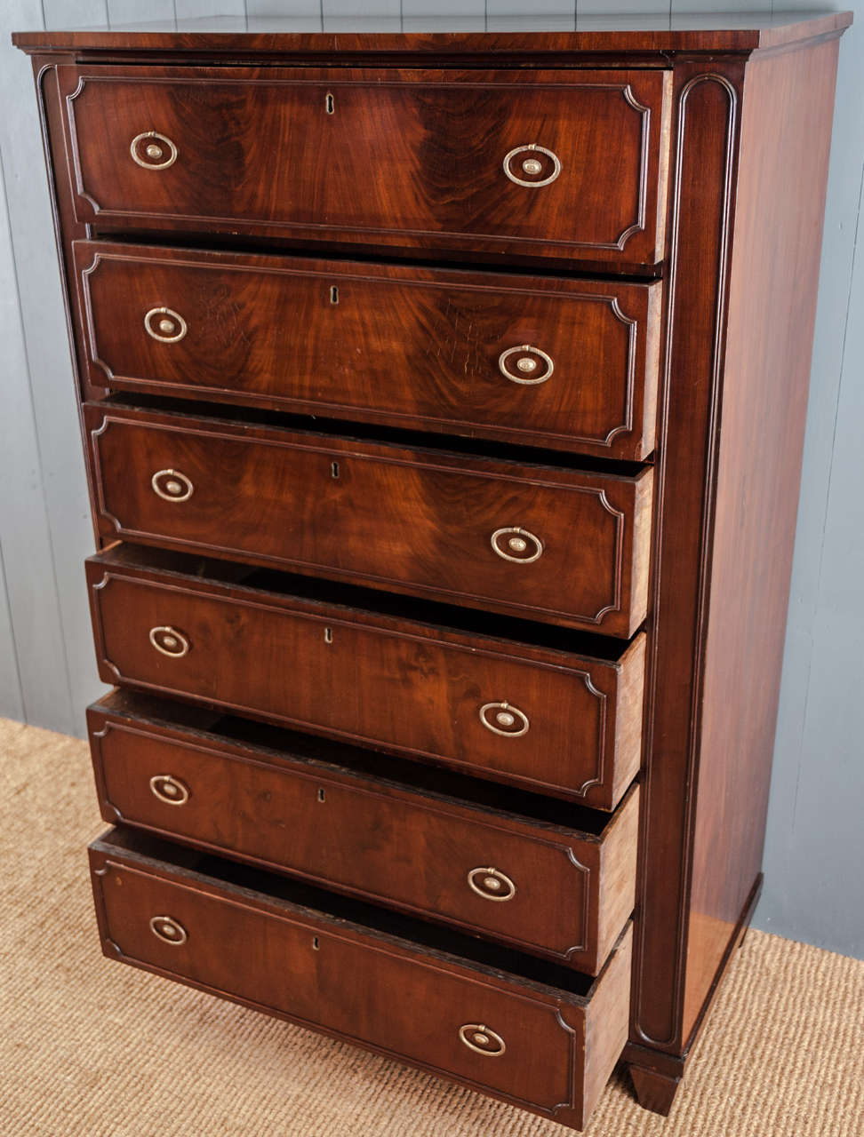 19th Century Tall Continental Figured Mahogany Six Drawer Chest