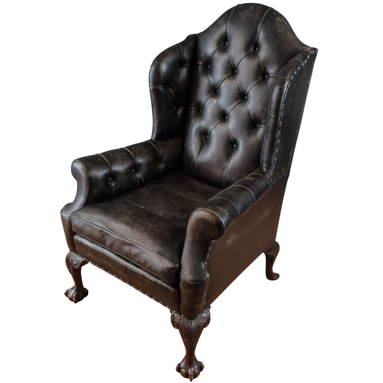 A 19thc Mahogany Buttoned Leather Wing Armchair For Sale
