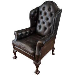 A 19thc Mahogany Buttoned Leather Wing Armchair