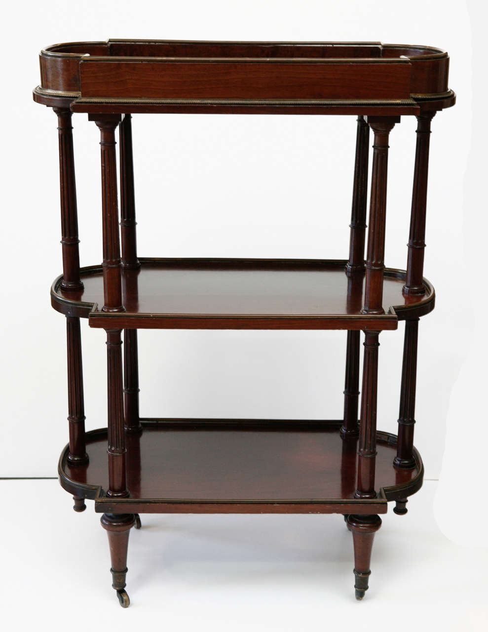 A French Mahogany Three-Tier Side Table