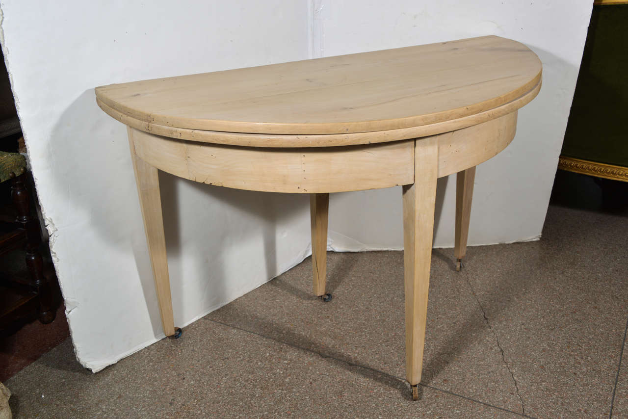Hinged Table Top. When extended, held in place by drawer with matching leg.