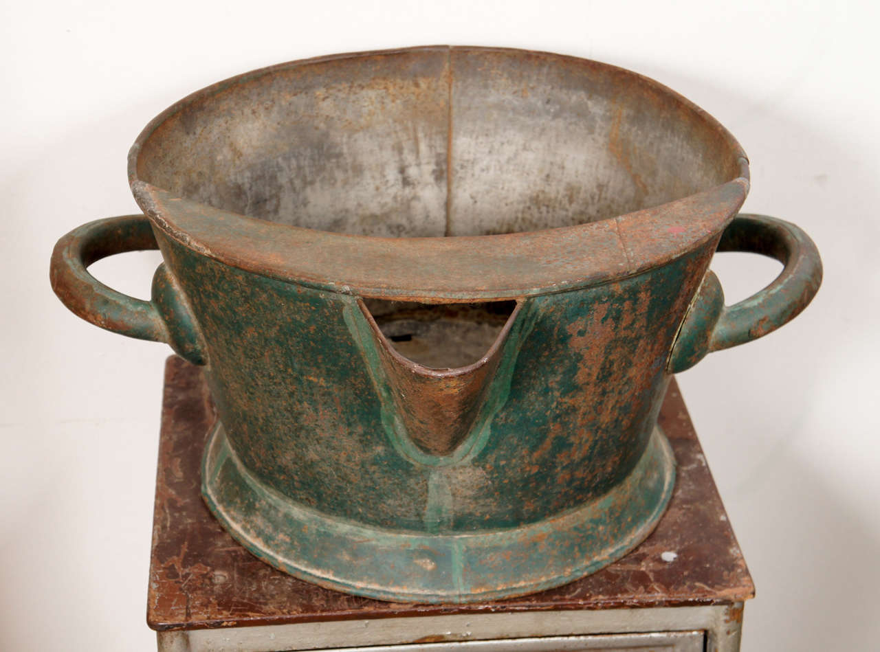 19th century French green tole wine maker's spouted pitcher with handles. Makes a great cachepot or jardinière for a large plant. Small hole in the bottom, so doesn't hold liquid any more.