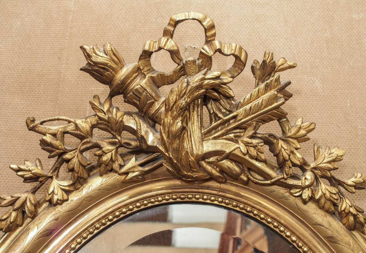 antique oval beveled mirror