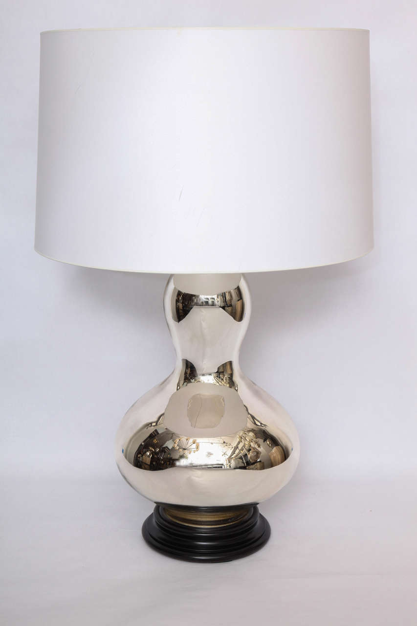 A 1960s mercury glass table lamp.
Shade not included