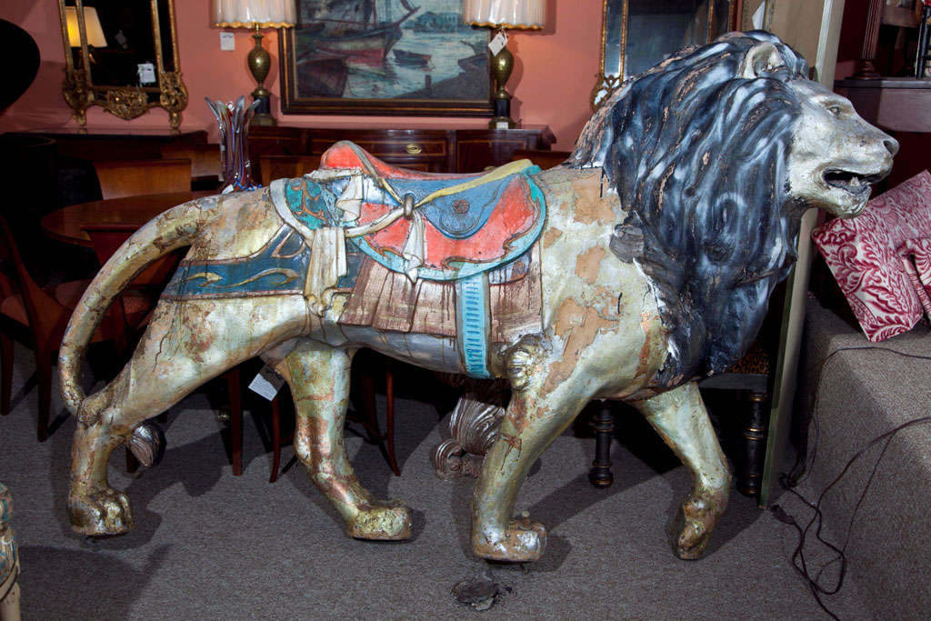 Very decorative paint decorated fiberglass lion. Very life like. Would look great in a pool house or playroom. Mounts to floor to sit upon.