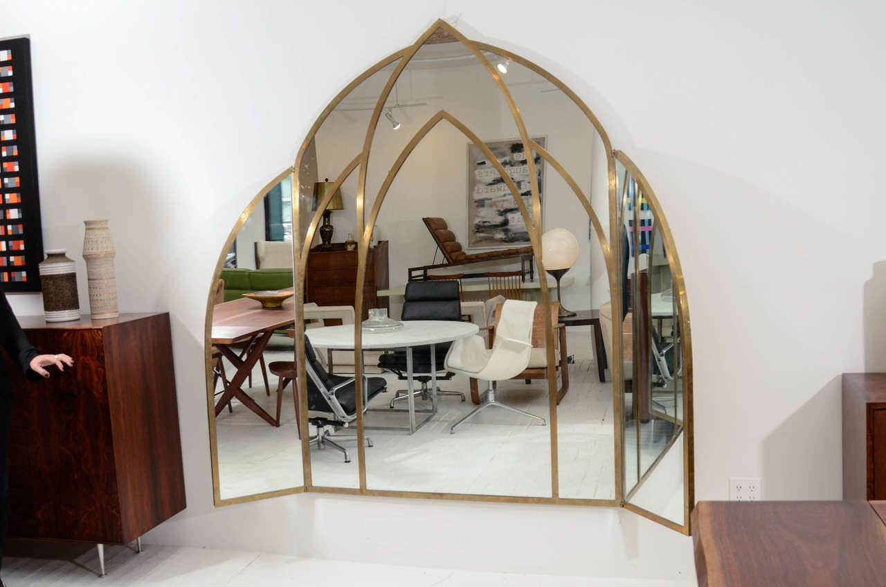 Crespi Gothic inspired brass mirror. 
Can hang on wall or freestanding on floor. Two hanging sides full finished brass backing.
 Few of these were ever produced. Impressed signature. [Gabriella Crespi]