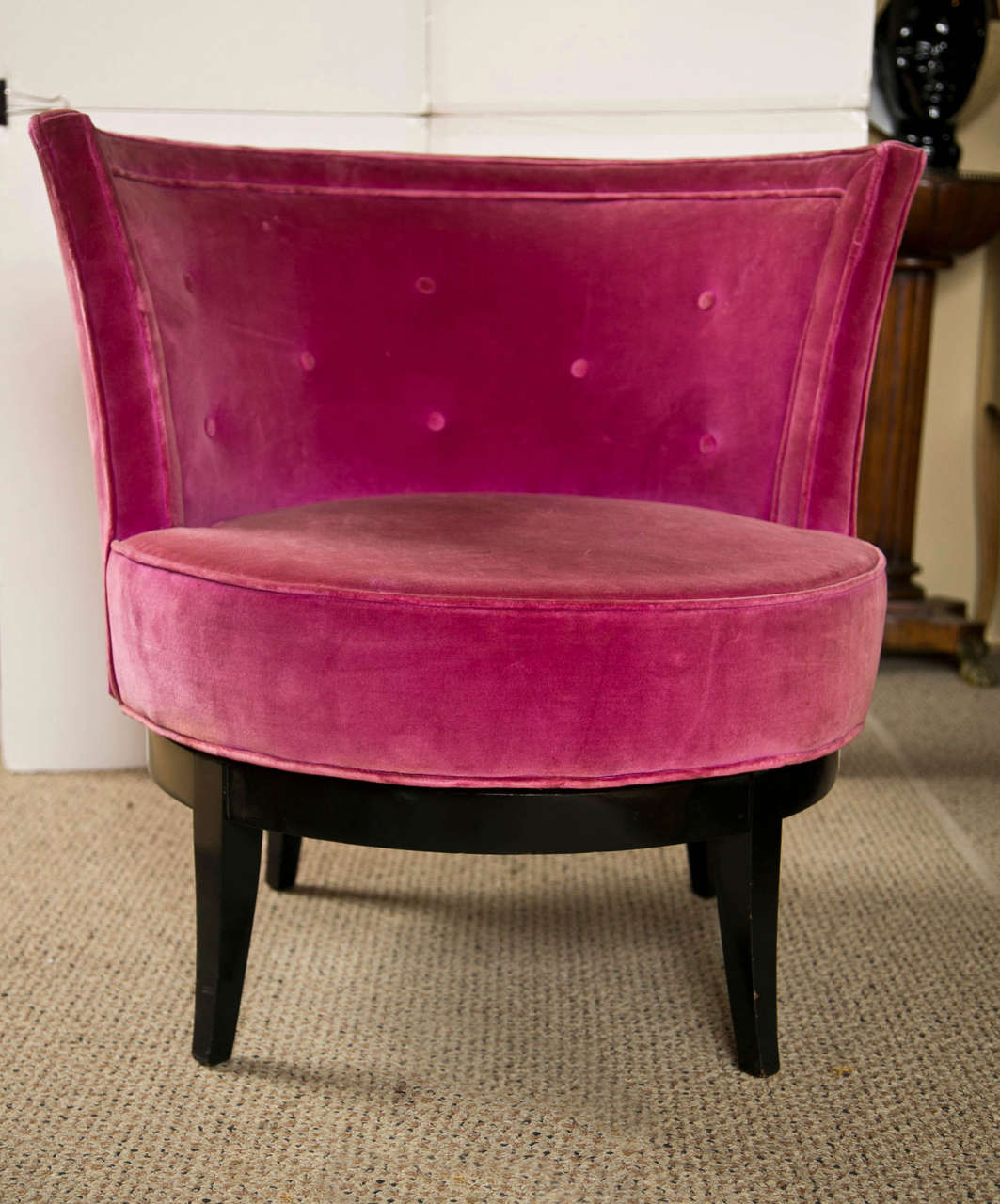 Styled in the 1930's these rose colored velvet are  comfortable
swivel round chairs- Ebonized finish bases- 16 1/2