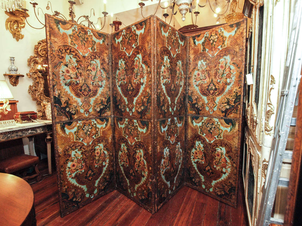17th c. Spanish Cordovan Polychromed leather panels now as a screen of four panels with eight panels of leather. Leather is tooled and polychromed. It has expected tears and shrinkage for its age
