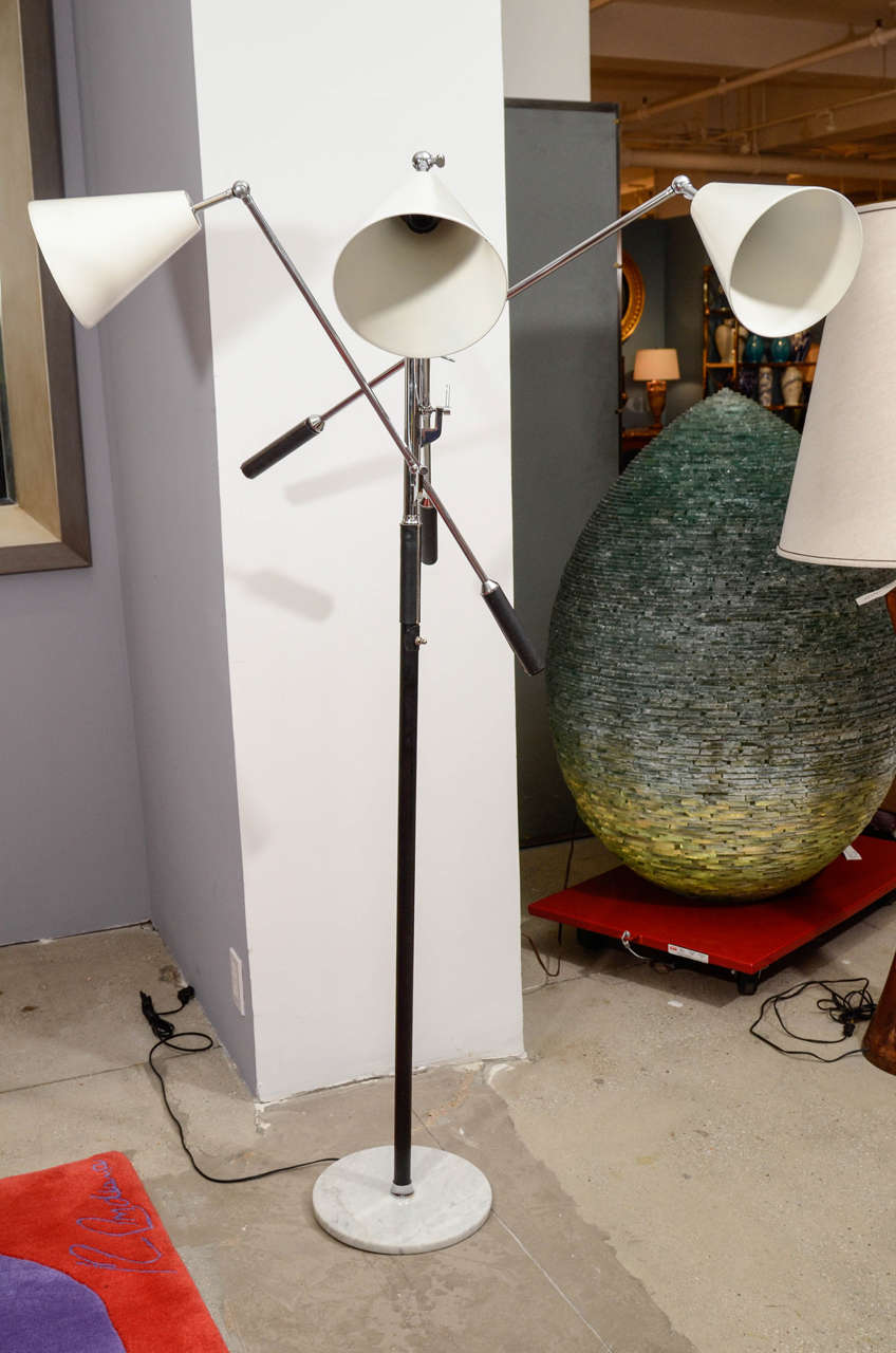 Gino Sarfatti for Arteluce Trienalle Floor Lamp with 3 adjustable arms, conical white enameled shades,Carrara marble base.
Rewired.
