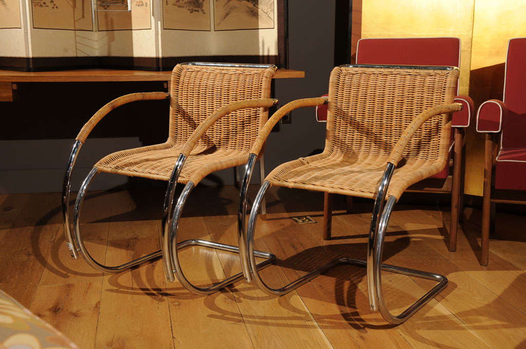 The MR20 lounge chair designed in 1928 by Ludwig Mies Van Der Rohe, covered with cane.
Priced per chair, four available.